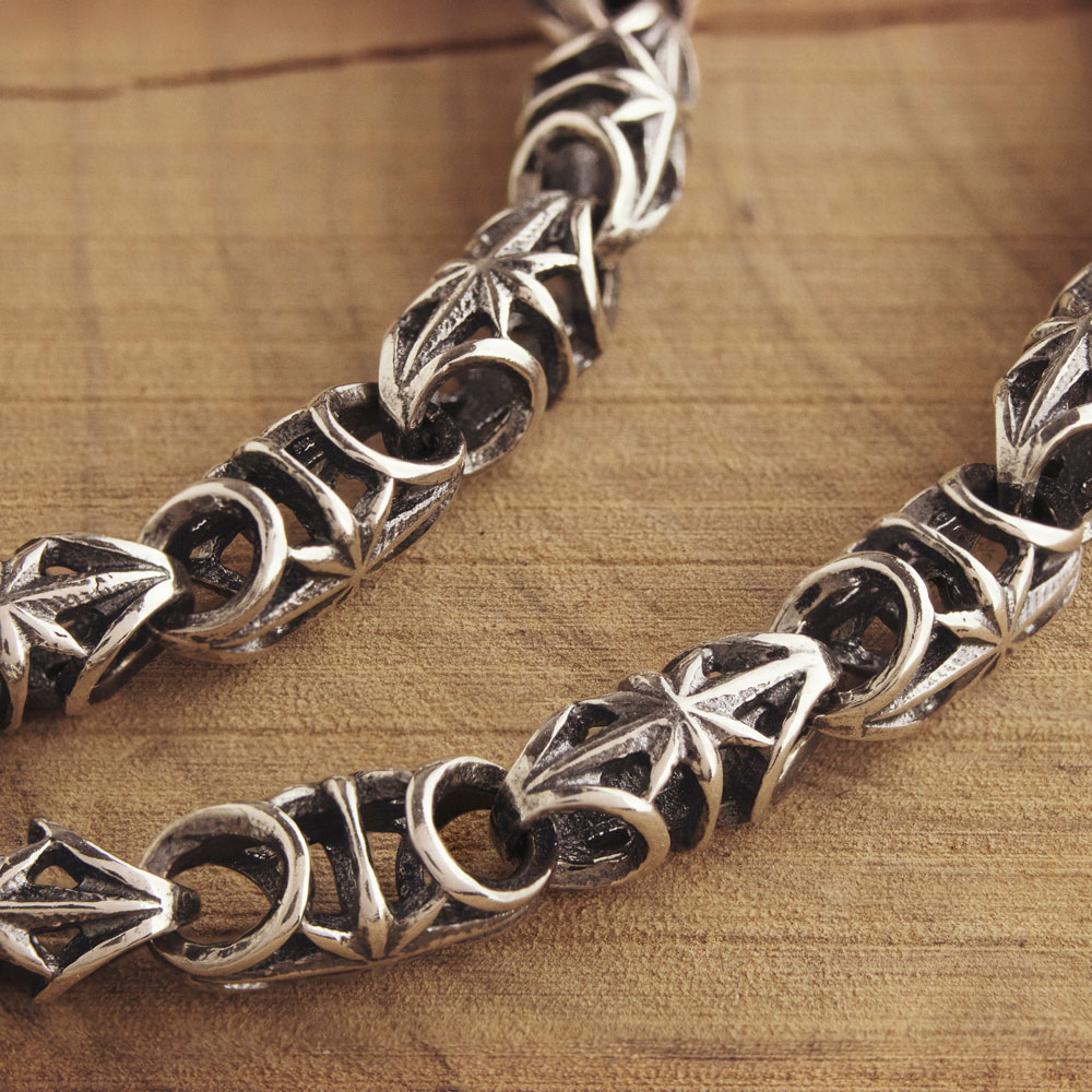 Artisan Bracelet in Solid Sterling Silver with Oxidized Finish on wooden background