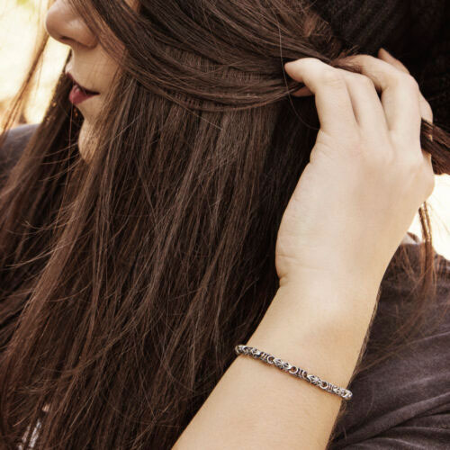 Silver Artisan Link Chain Bracelet worn by a woman