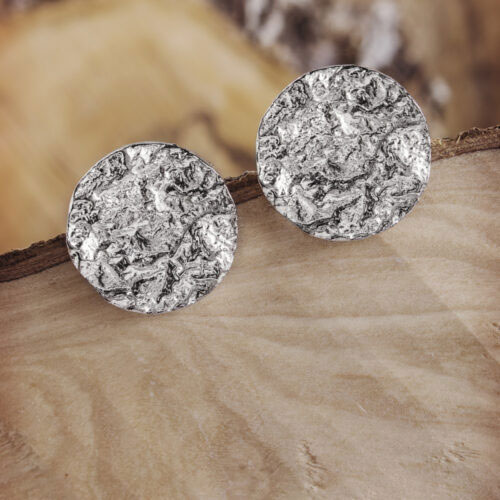 Disc Stud Earrings on a wooden background