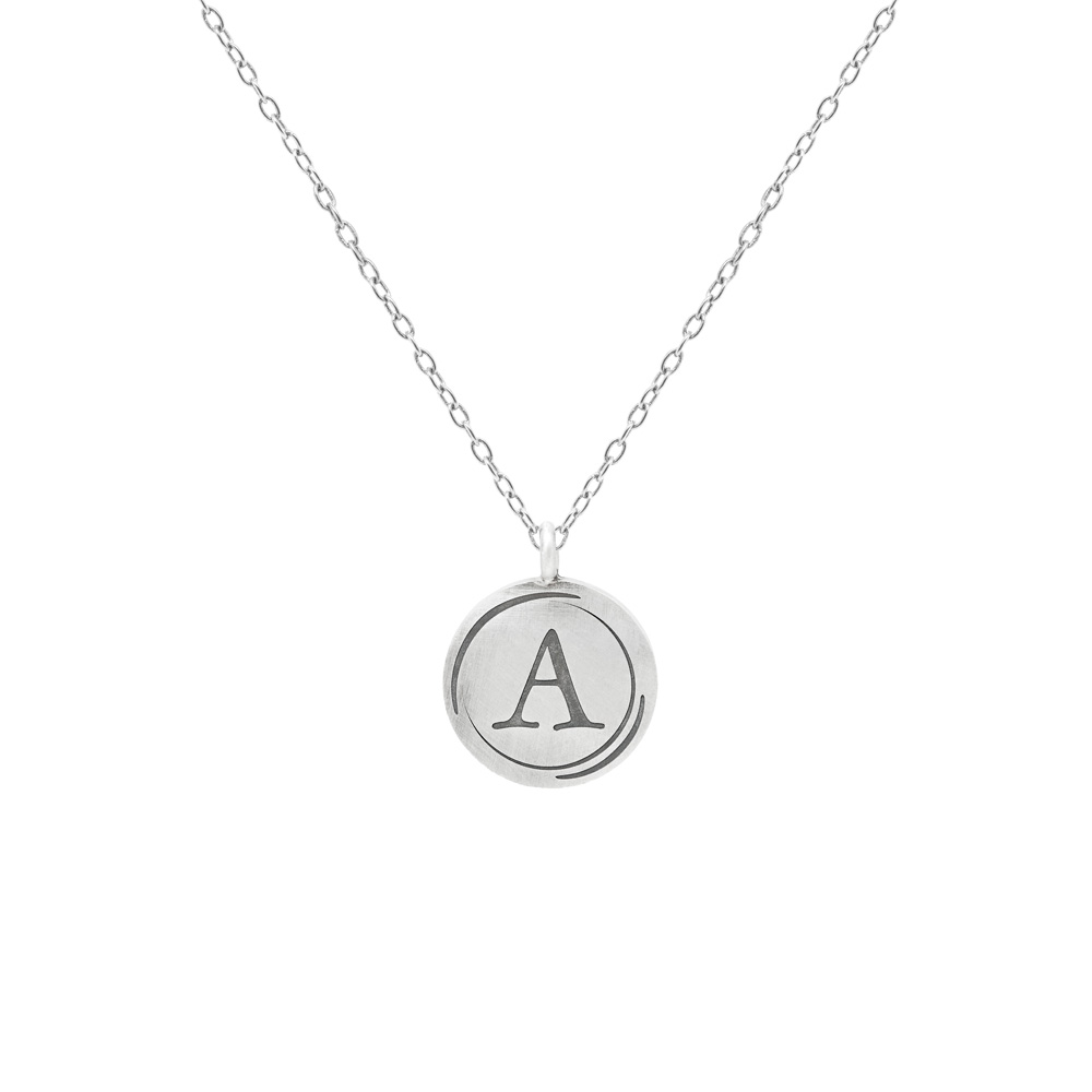 Initial Round Pendant Necklace in Sterling Silver with a chain on a white background