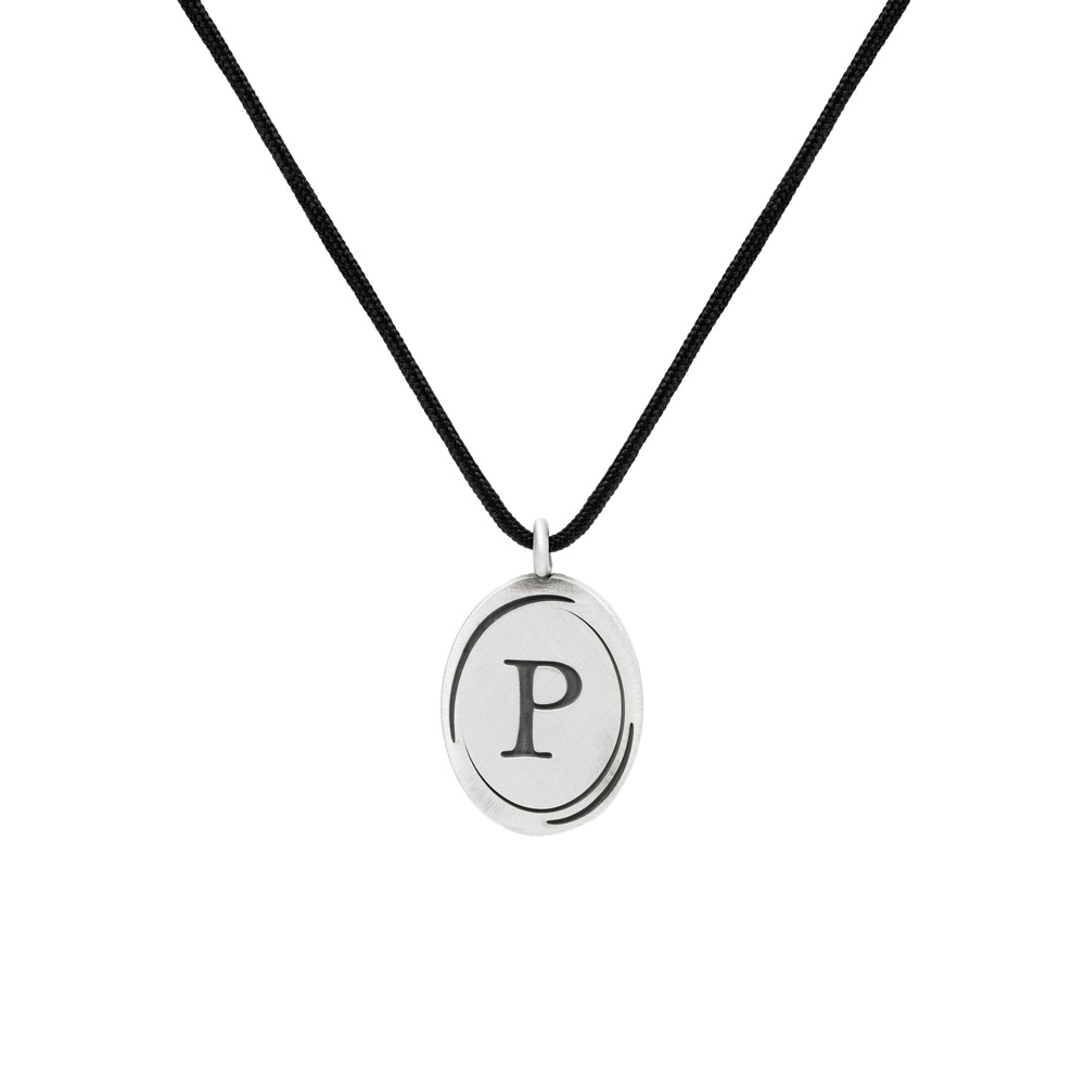 Sterling Silver Oval Necklace with a Monogram and a black cord on a white background
